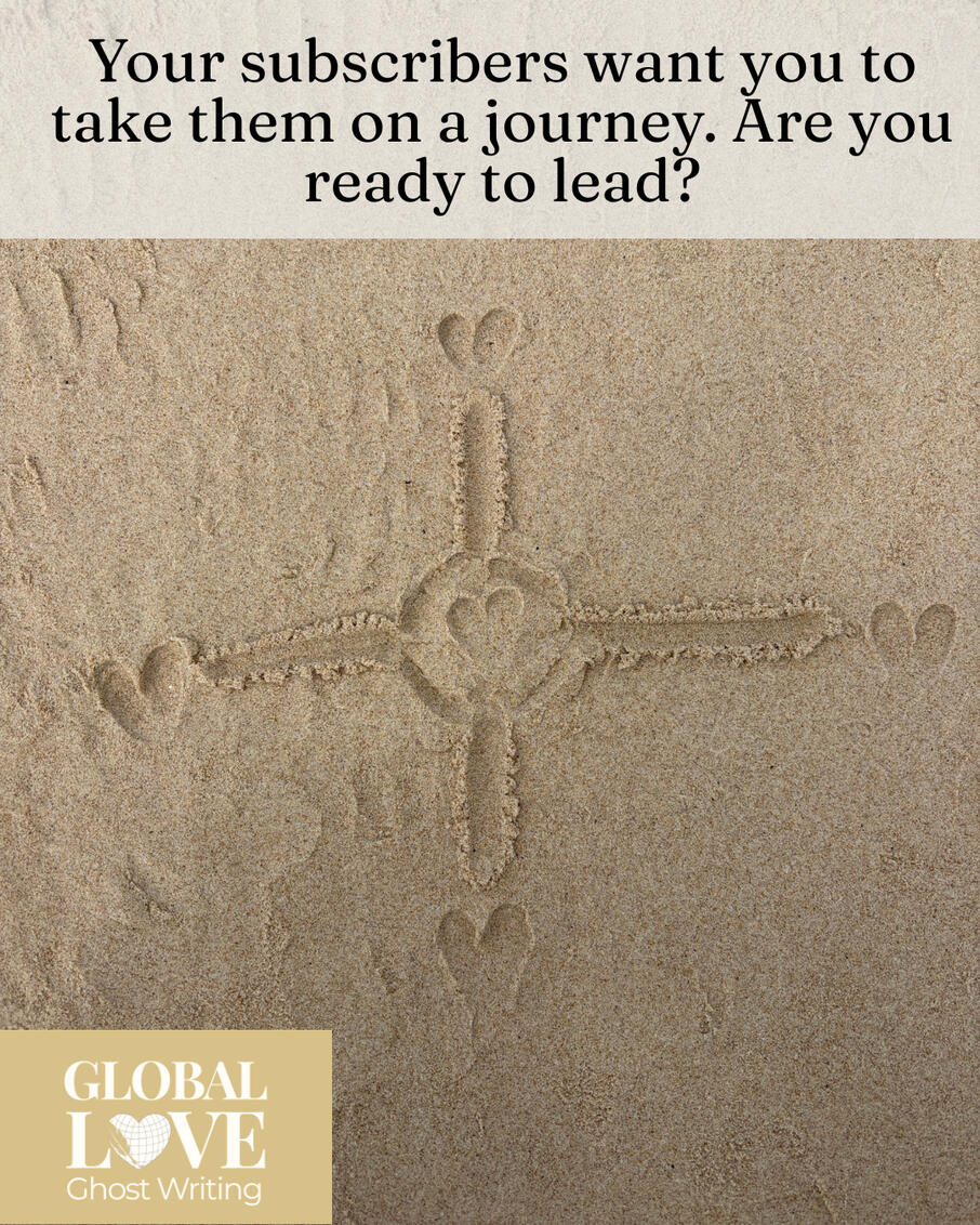 Heart compass in sand with Global Love Ghost Writing Logo Quote from Liz Brown Morgan of Global Love Writing over a heart-shaped compass drawn in beach sand in Tarifa, Spain: "Your subscribers want you to take them on a journey. Are you ready to lead?"